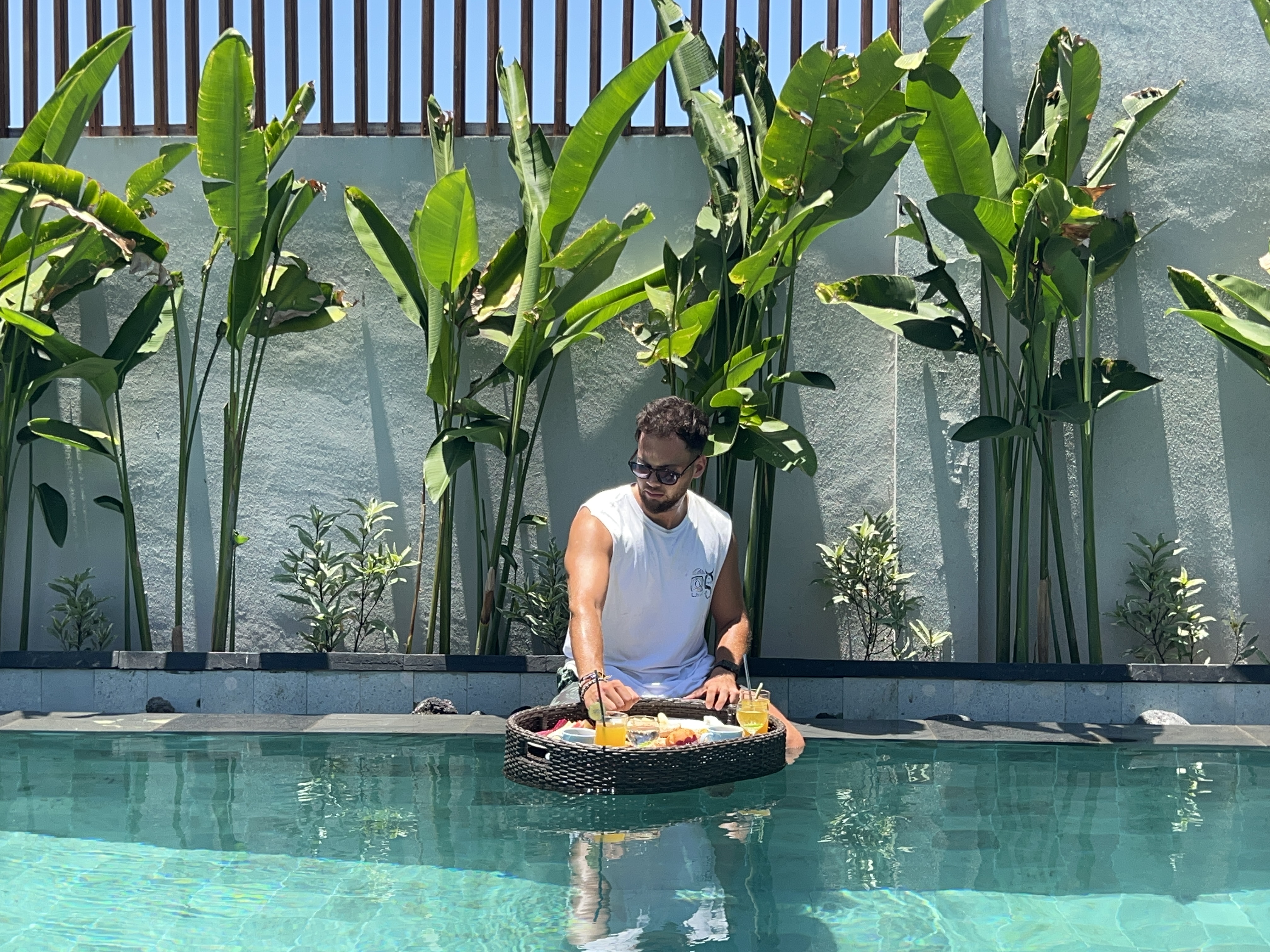 two women sitting in front of white table