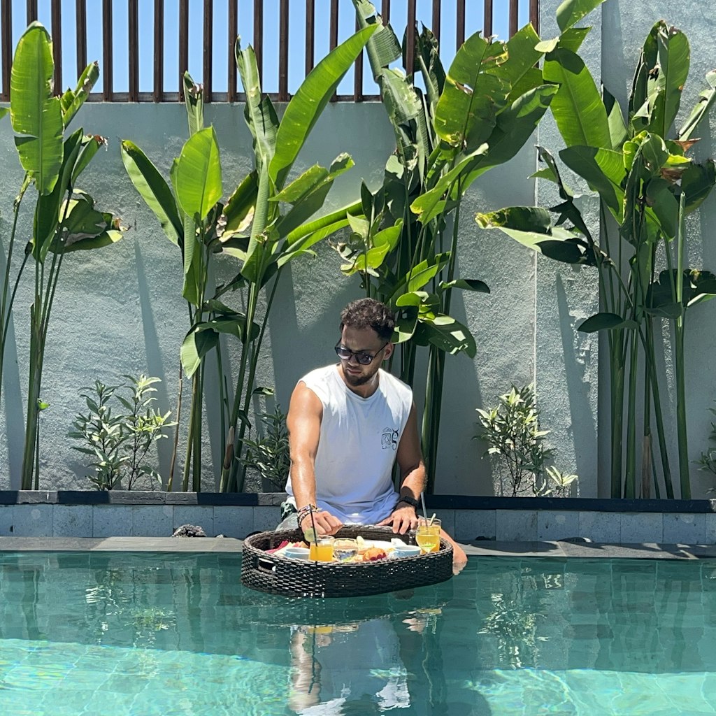 two women sitting in front of white table