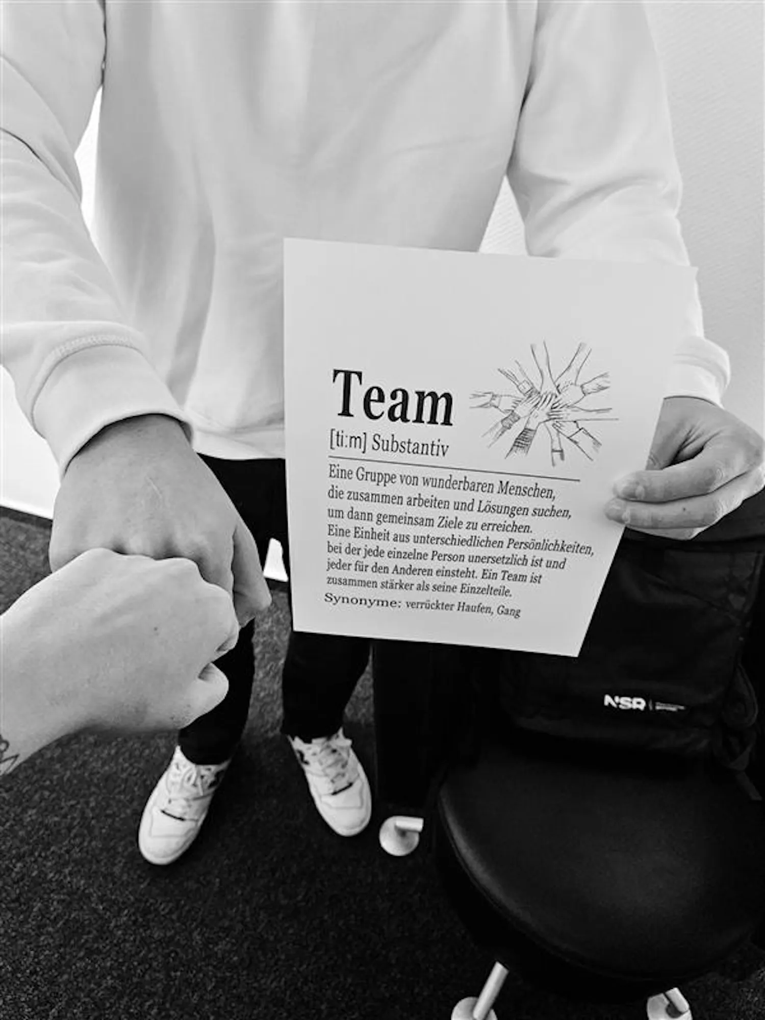 Karte mit der Definition von Team