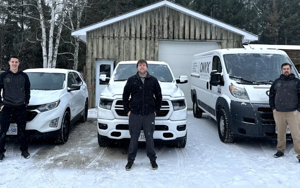 The local Onyx Security team standing together outside