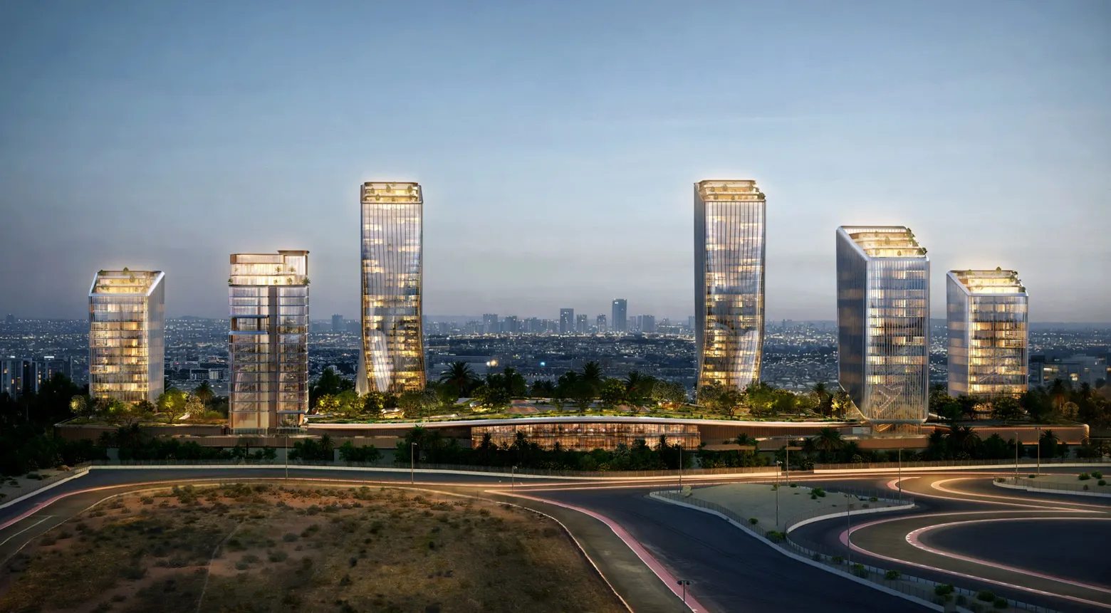 Seven modern glass skyscrapers with illuminated interiors stand behind a curved road with light trails, set against a city skyline at dusk.