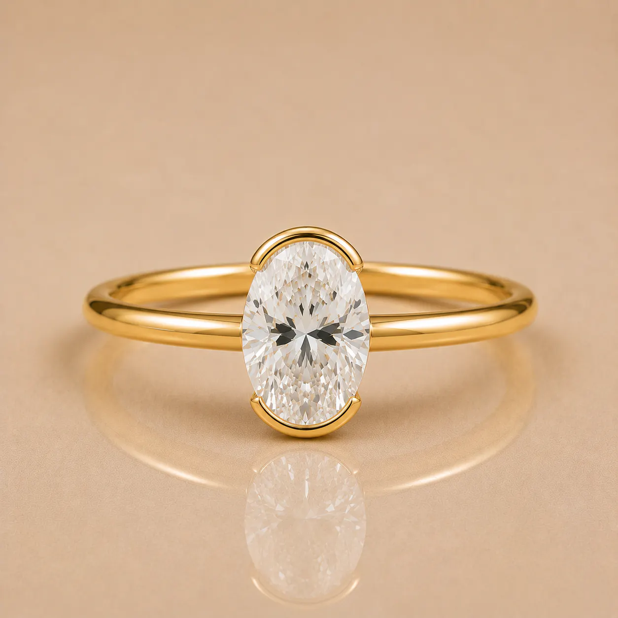 Gold ring with a large oval-cut clear diamond set in a minimalist prong setting, displayed on a neutral background with its reflection visible below.