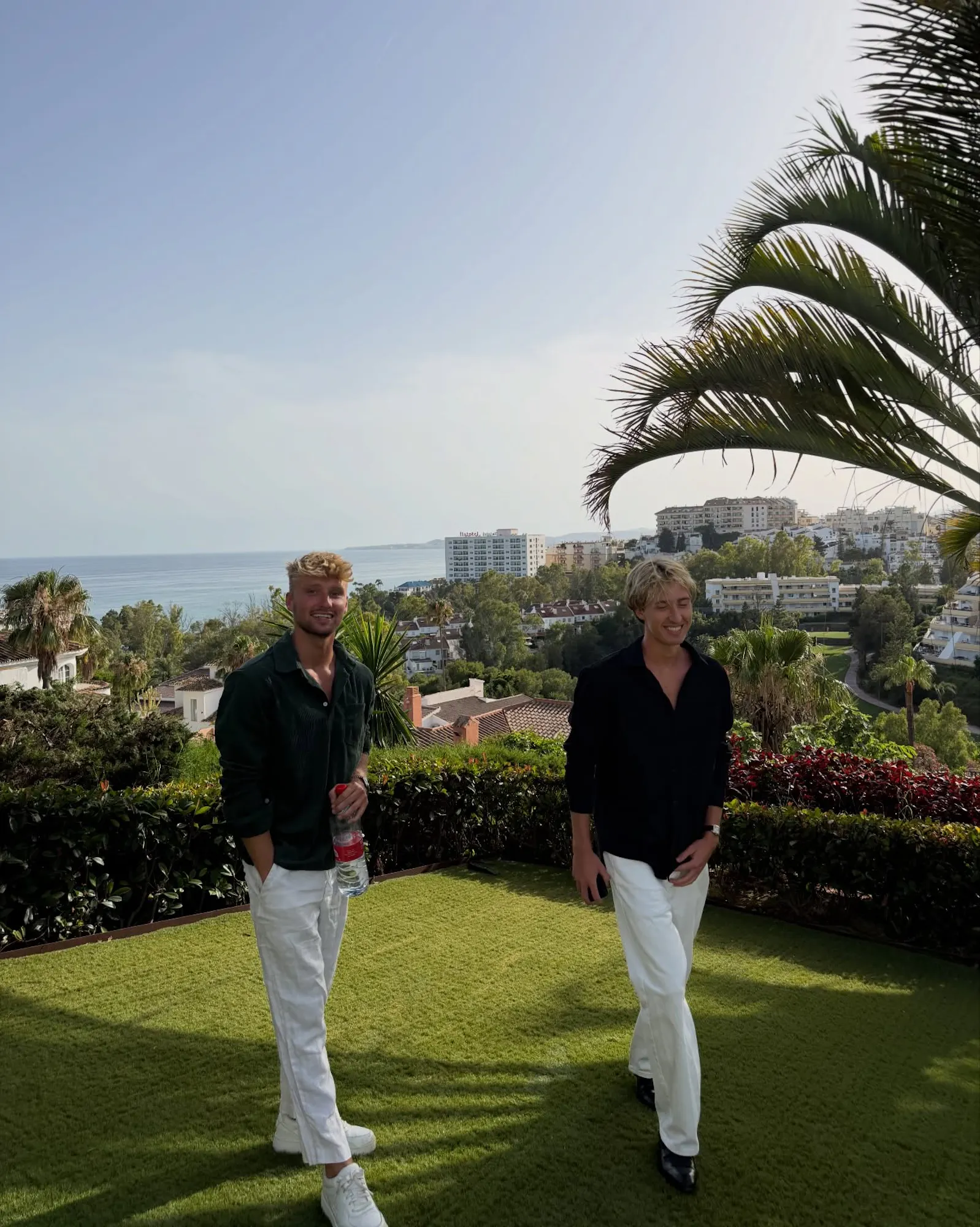 two men at seaside villa