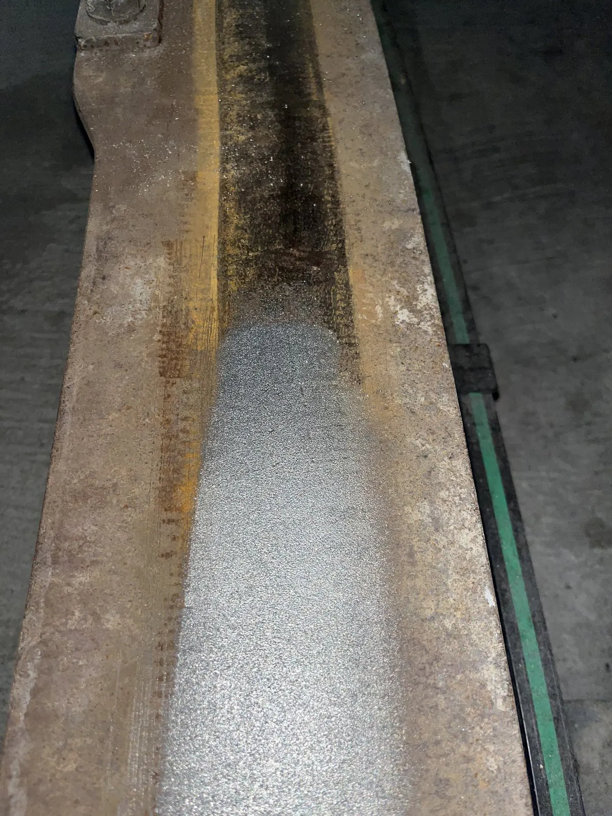steel rail dirty and freshly blasted