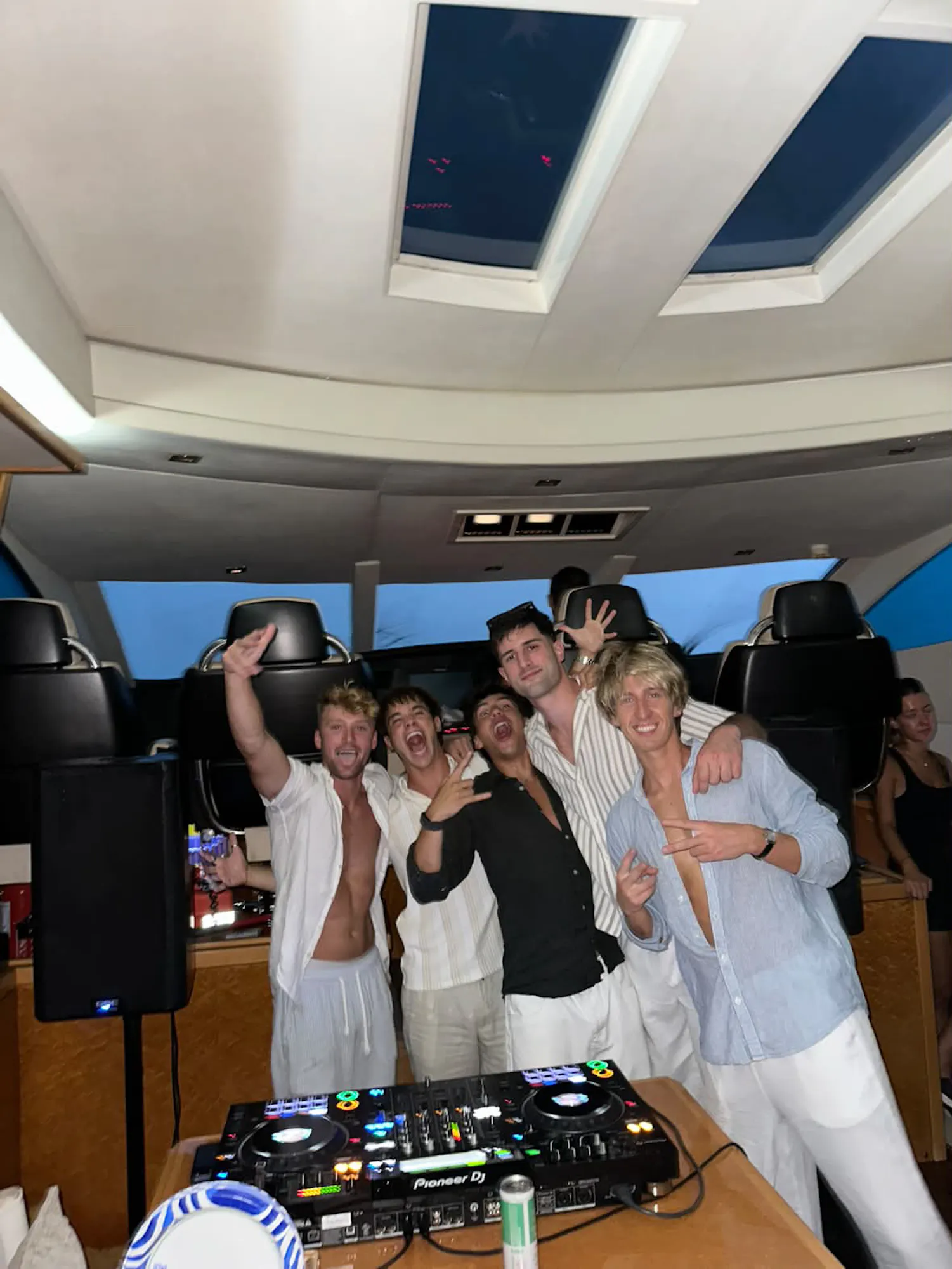 friends celebrating on a boat