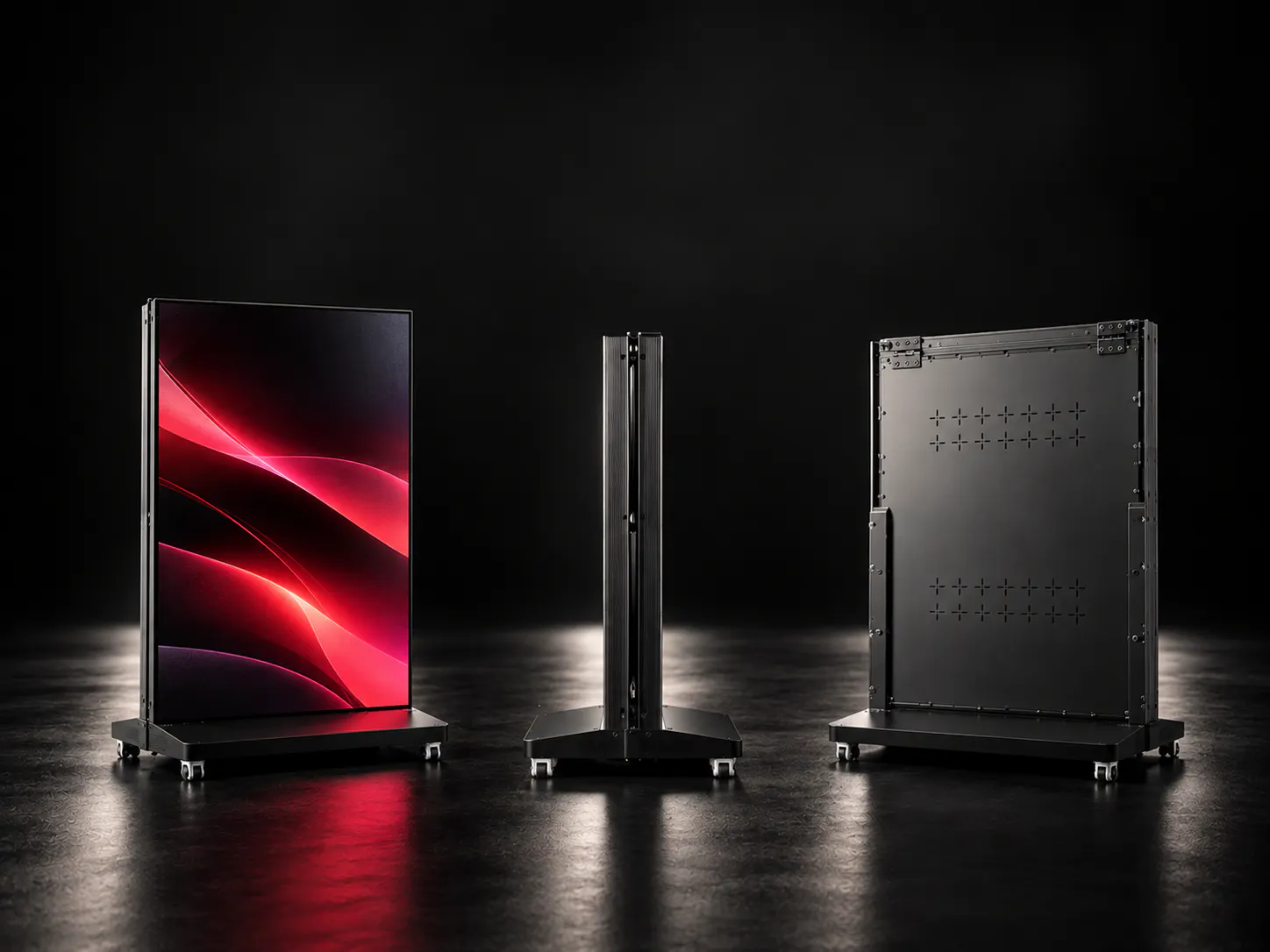 Tall rectangular display panels with black frames on wheeled bases shown from front, side, and back angles against a dark background.